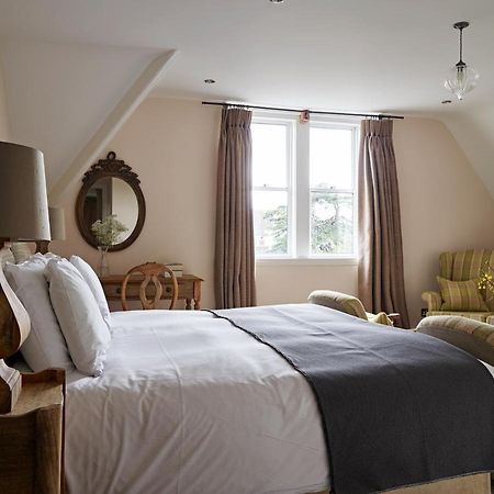Cotswold Grange Bed and Breakfast Cheltenham Exteriör bild A bedroom at The Pig