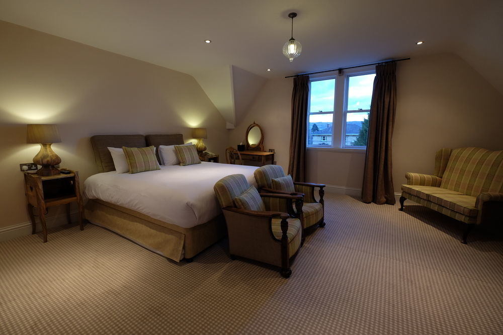 Cotswold Grange Bed and Breakfast Cheltenham Exteriör bild A bedroom at the hotel